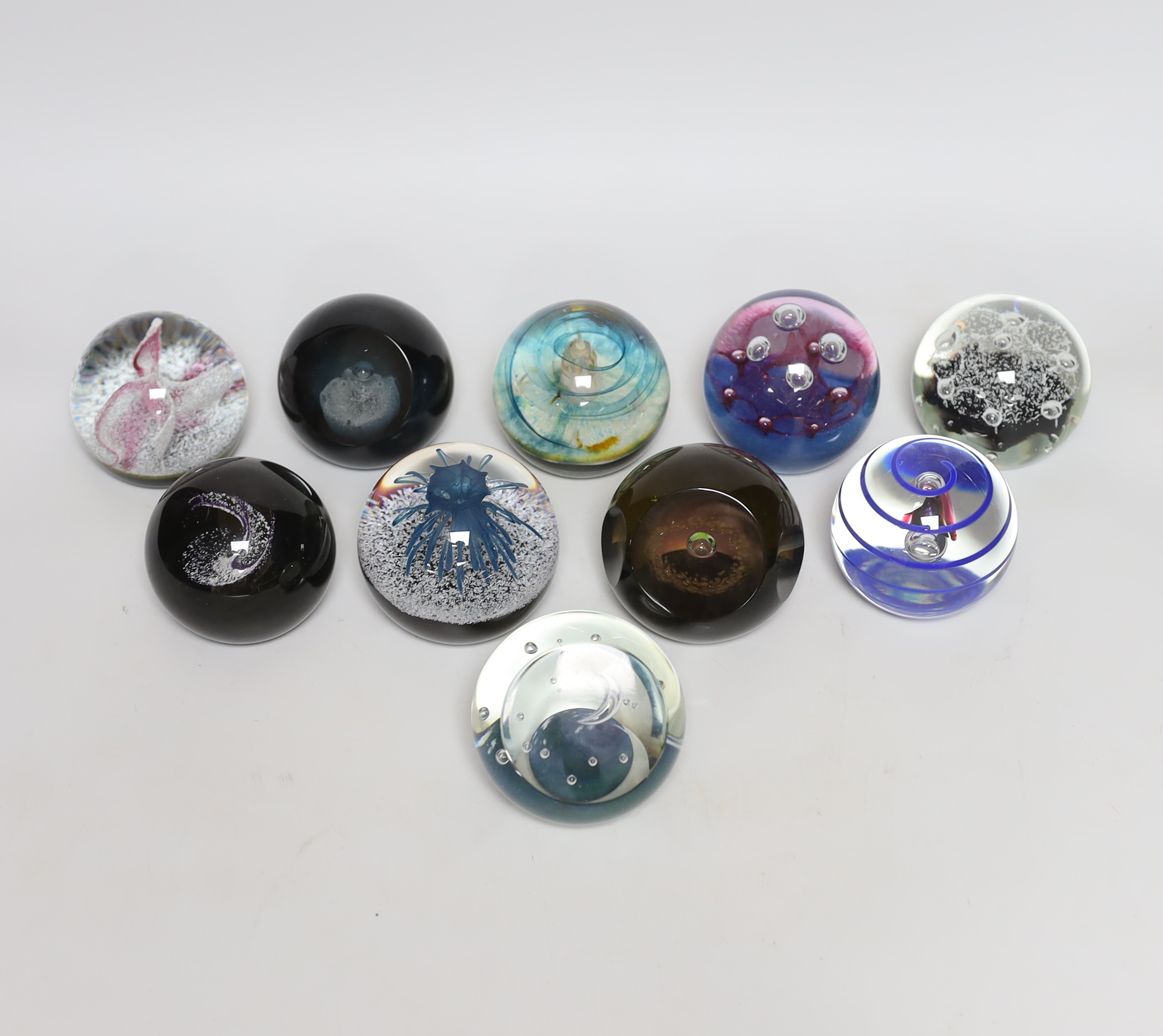 Ten Caithness paperweights including Viking Flame, limited edition 216/750 and Eterna, 175/500, each with boxes, the largest 7.5cm high